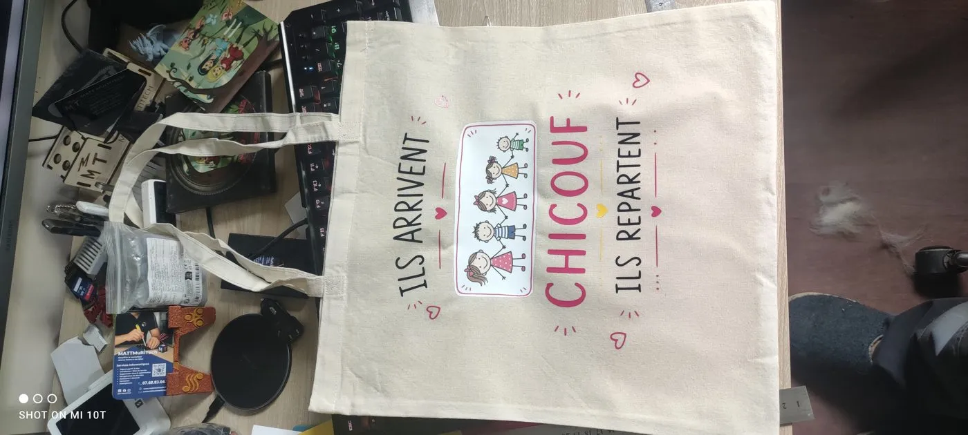 Sac en toile naturelle marqué d’une illustration couleur et d’un texte
